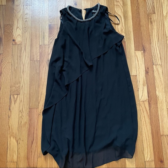 Black sleeveless dress with neck embellishments - Picture 2 of 3